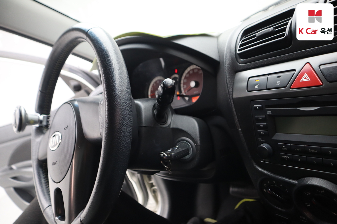 كيا مورنينج 2011 - صورة 11